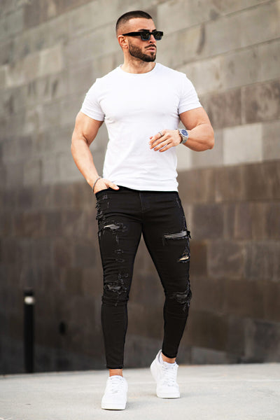 Zerrissene Schwarze Skinny Jeans Herren
