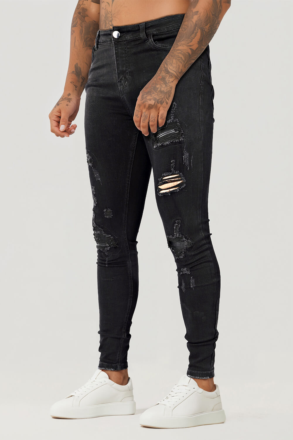 Zerrissene Schwarze Skinny Jeans Herren